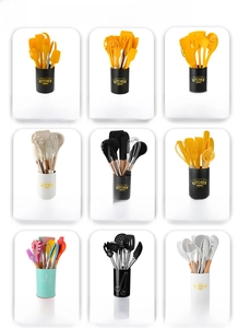 Detail of cream silicone kitchen utensils with wooden handles in a 10-piece professional set