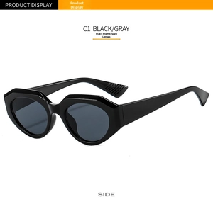 Detail of C1 black oversized geometric frame sunglasses with dark gray lenses
