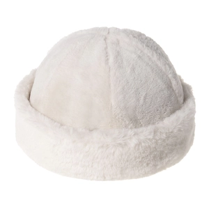 Close-up of beige faux fur brimless hat showing thick plush texture and warm material