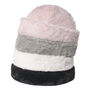 Stacked thick faux fur beanies in pink, grey, cream, and black for winter warmth