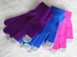 Detail of colorful knitted touch screen gloves with ribbed cuffs and warm fleece lining