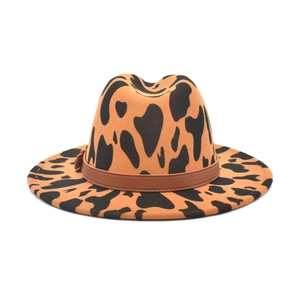 Stylish cow print wool fedora hat with wide brim and brown leather band for women