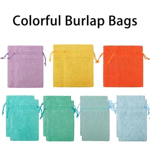 Colorful linen drawstring bags for jewelry packaging shown in seven vibrant colors