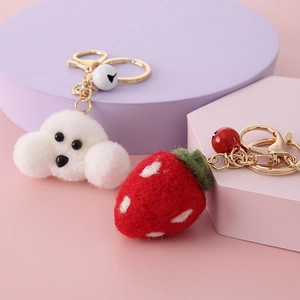 Cute teddy dog and strawberry wool felt keychains with gold bells and clasps