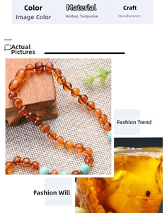 Detail of handcrafted Baltic amber teething necklace with turquoise beads on wood