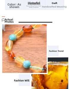 Detail of handcrafted Baltic Amber baby bracelet with natural turquoise and gold amber beads