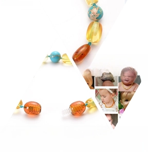Detail of Baltic amber baby bracelet featuring safety screw clasp and double-knotted beads