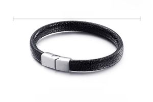 Close-up of 9mm black silicone bracelet with 316L stainless steel clasp and leather texture