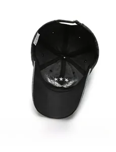 Detail of internal structure with cotton sweatband and adjustable strap on baseball cap