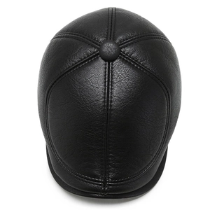 Men's winter leather flat cap in black with multi-panel stitching and top button detail