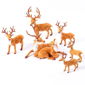 Close-up of artificial sika deer ornaments with realistic flocking texture for Christmas