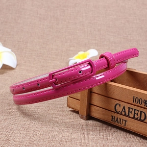 Minimalist glossy patent leather skinny belt for women in vibrant fuchsia with square buckle