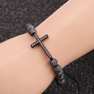 Adjustable cross bracelet with 8mm micro-pave zircon balls and copper beads on model