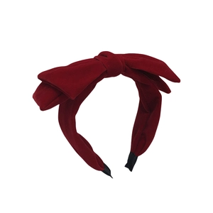 Elegant red velvet headband featuring a large double bow with anti-slip design for women