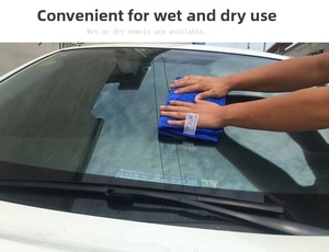 Blue microfiber car cleaning towel used on glass for wet and dry wiping