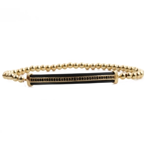 Minimalist gold beaded bracelet set with black micro-pave rhinestone bar detail