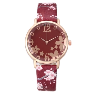 Women's quartz watch with red cherry blossom pattern strap and floral relief dial
