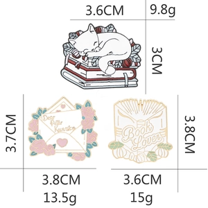 Set of three cute cartoon cat and book lover enamel pins for backpacks and denim