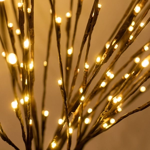 Decorative LED branch lights with warm yellow glow for Nordic style home room decoration