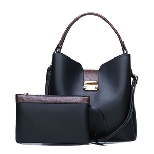Black synthetic leather bucket bag set with snakeskin texture accents and gold clasp