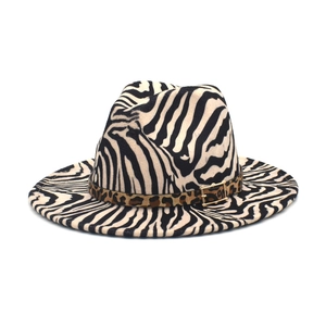 Close-up of zebra pattern wool fedora with leopard print band and gold buckle