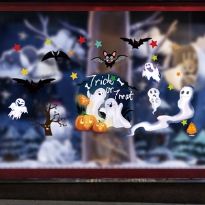 Detail of Halloween window stickers featuring ghosts, pumpkins, and Trick or Treat text