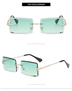 Macro detail of rimless square sunglasses with gradient green lenses and gold metal temples