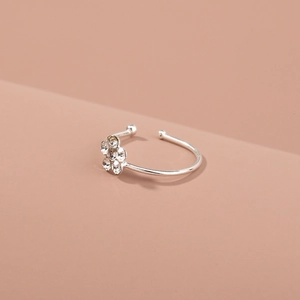 Silver flower nose ring with sparkling rhinestones in a minimalist circular design