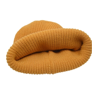 Classic mustard yellow ribbed knit beanie hat for winter warmth and street style fashion