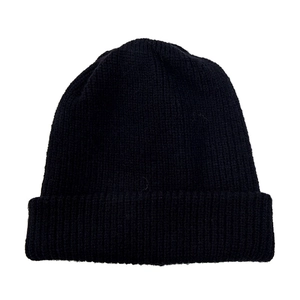 Close-up of black ribbed knit beanie with double-layer cuff and warm vertical texture