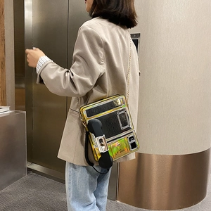 Bolso de hombro para mujer con forma de teléfono retro creativo y acabado láser elegante.