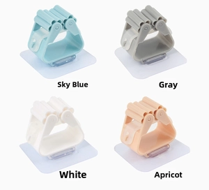 Wall-mounted mop and broom holders in sky blue, gray, white and apricot colors