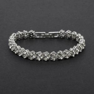 Detail of silver multi-row tennis bracelet featuring rows of clear zircon pavé crystals