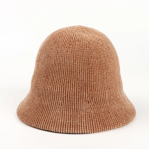 Close-up of caramel chenille fabric texture on a round top winter bucket hat for women