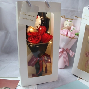 Elegant gift box with red soap roses, plush bear, and LED lights in a white gift bag