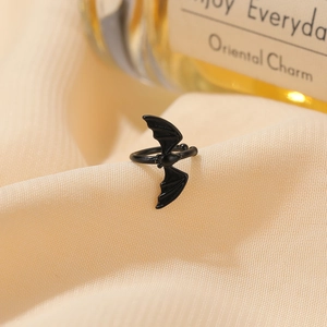Gothic black bat wing ear cuff wrap earrings on silk for a vintage Halloween look