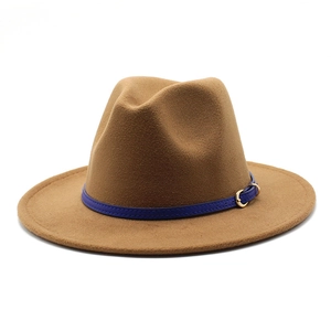 Detailed view of the wide brim fedora hat with blue belt buckle trim and wool texture