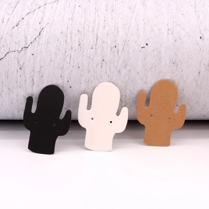 Three cactus shaped paper earring display cards in black, white and brown colors