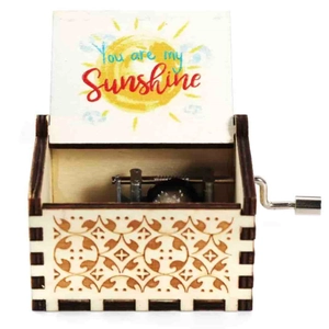 Wooden hand-cranked music box featuring You Are My Sunshine engraving and metal movement