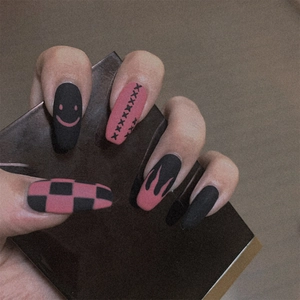 Pink and black flame checkerboard pattern press-on nails in long coffin matte finish
