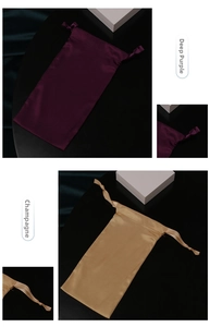 Detail of silk satin drawstring pouches in dark purple and champagne with ribbon closure