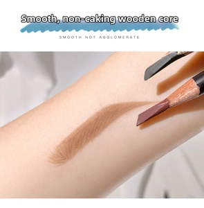 Close-up of eyebrow pencil swatches on skin showing smooth texture and sharp tips