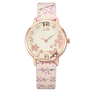 Women's quartz watch featuring floral leather strap and butterfly dial in rose gold case