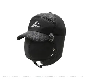 Detail of black winter trapper hat with Supplex embroidery and adjustable metal buckle