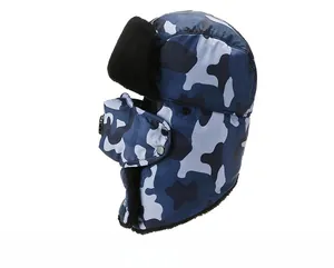 Side view of winter camouflage trapper hat with thick black fleece lining and face mask