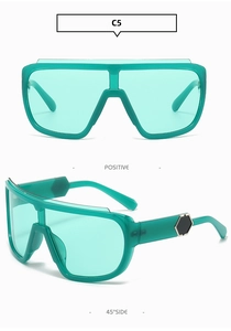 Detail of teal oversized wrap-around sunglasses with black hexagonal temple accent