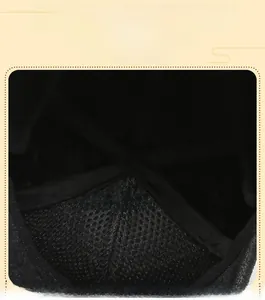 Macro detail of men's winter hat showing warm thermal lining and keep warm labels