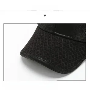 Detailed macro view of black baseball cap brim with precise diamond weave pattern