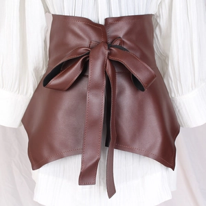 Fashionable dark brown wide faux leather waist cincher belt with ruffle hem and lace-up bow