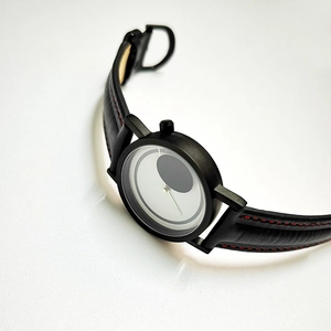 Minimalist waterproof leather watch with black case, white dial and red stitching